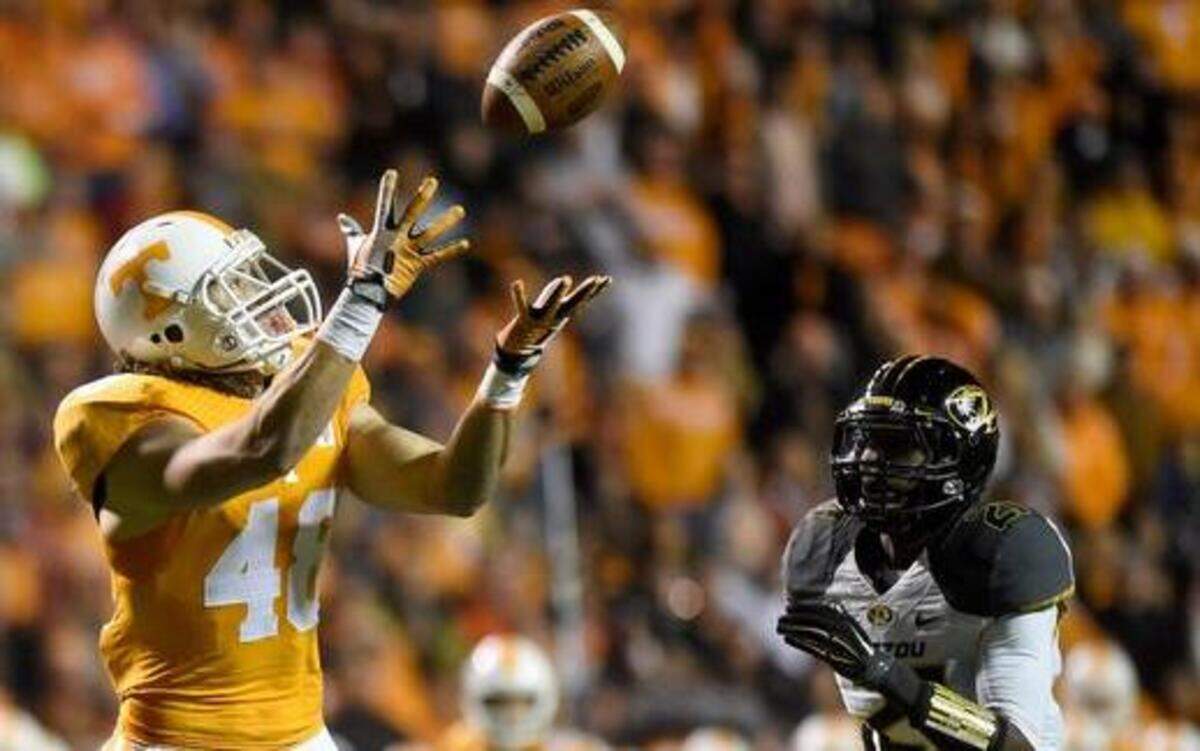 
Missouri safety Ian Simon was caught flat-footed as Tennessee tight end Alex Ellis (48) hauled in a toucdown pass on a fake field goal attempt in the first half Saturday night at Neyland Stadium. Missouri won the game 29-21 despite uncharacteristically sloppy play by the Tigers’ special teams.
