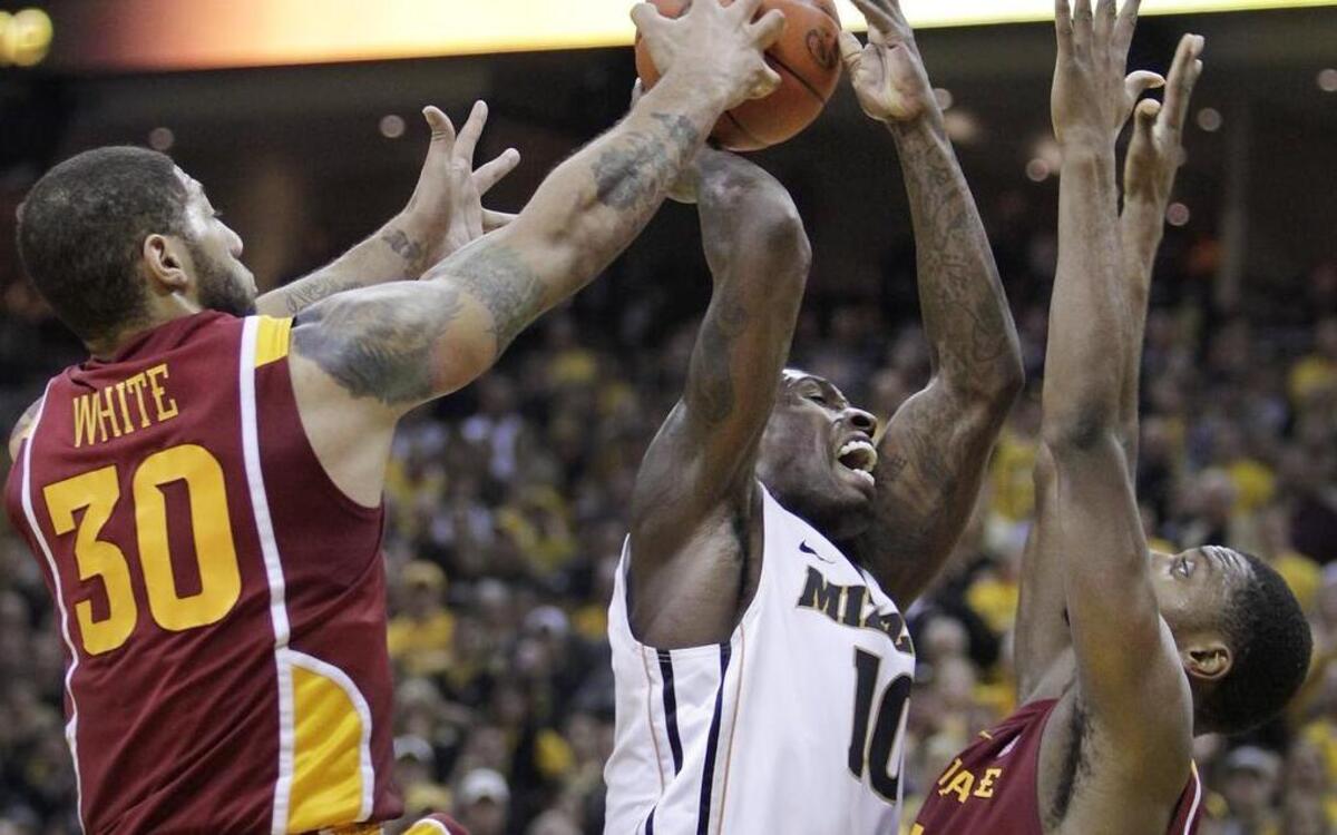 Ricardo Ratliffe fought off Iowa State’s Royce White (left) and Melvin Ejim for a rebound during the last Mizzou-Iowa State men’s basketball game, a 78-72 Tigers win on Feb. 29, 2012 at Mizzou Arena.