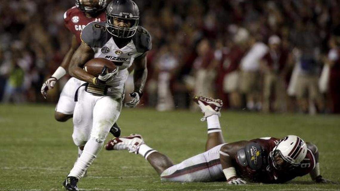 
Missouri and running back Marcus Murphy got past South Carolina and defensive tackle J.T. Surratt during the Tigers’ 21-20 win in Columbia, S.C., in September.
