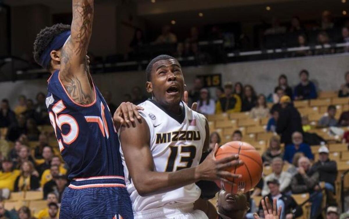 
Missouri's Montaque Gill-Caesar (right) was fouled by Auburn’s Jordon Granger during a game in March.
