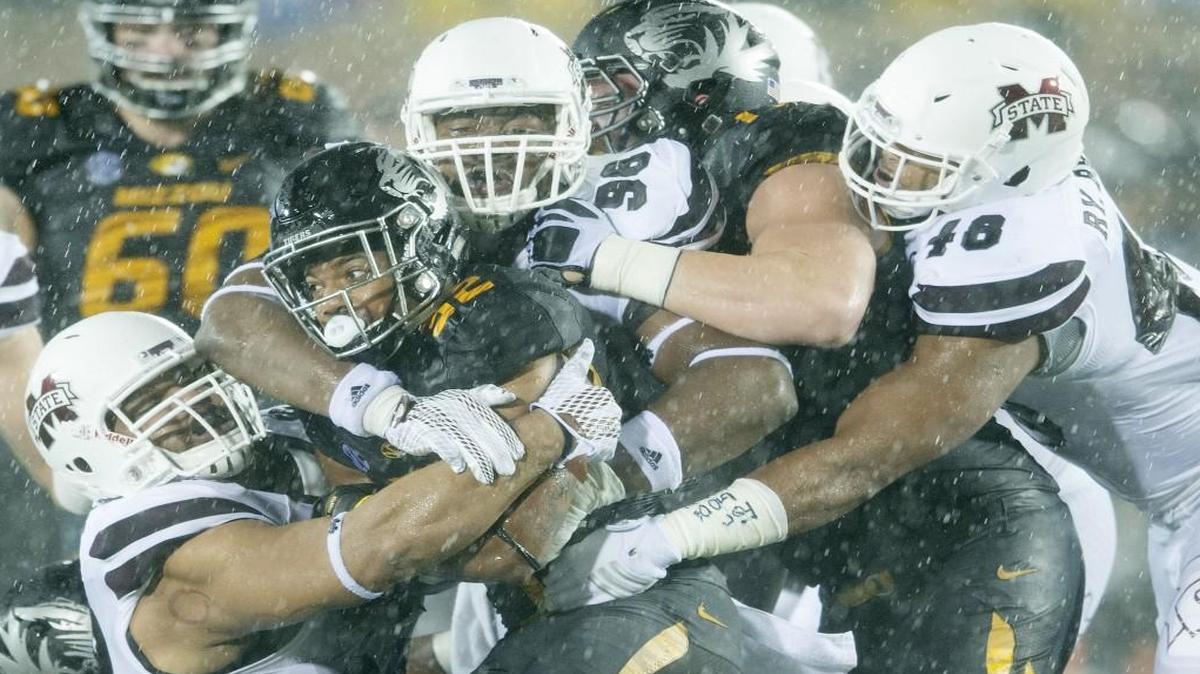 A bunch of Mississippi State defenders took down a Missouri runner during Thursday’s game.
