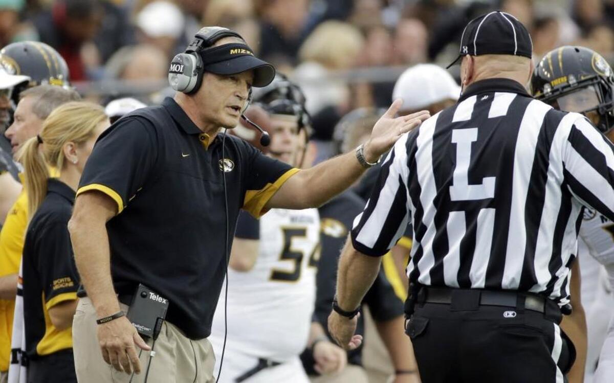 Missouri head coach Gary Pinkel argued a call with line judge Paul Petrisko in the first half of Saturday’s game.