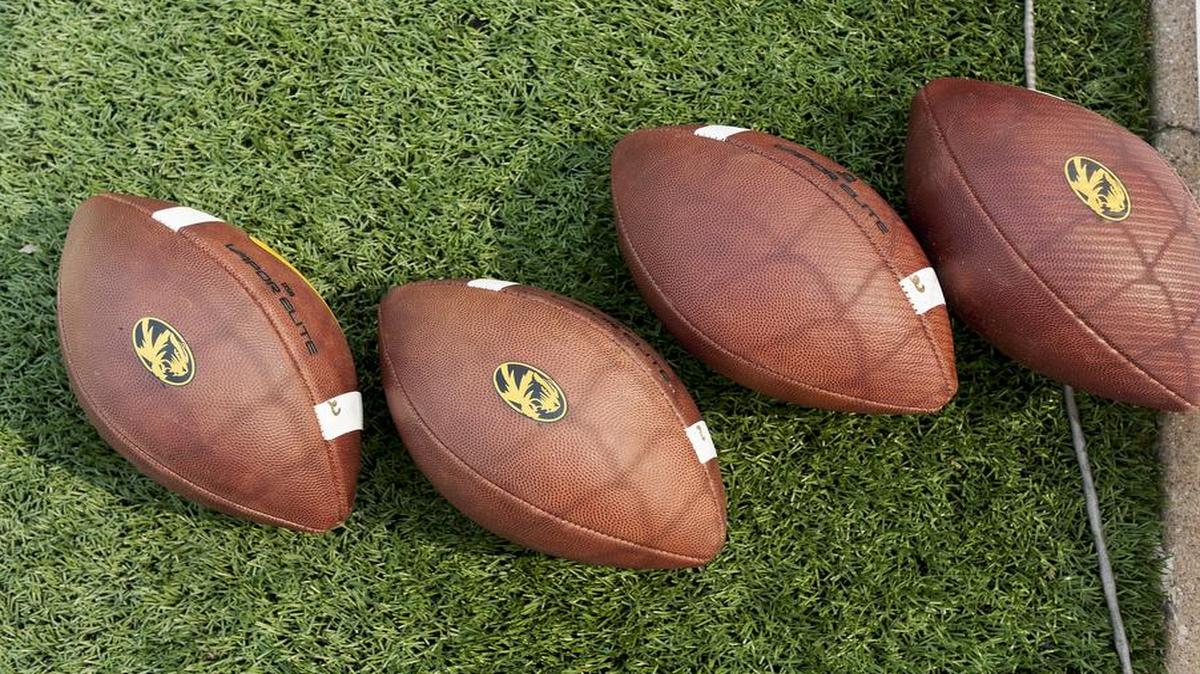 Footballs with the MU logo