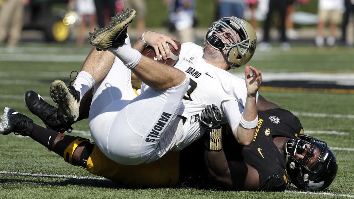 Idaho quarterback Matt Linehan was sacked for a 5-yard loss by Missouri defensive lineman Terry Beckner Jr. during the first half of the Tigers’ victory last week.