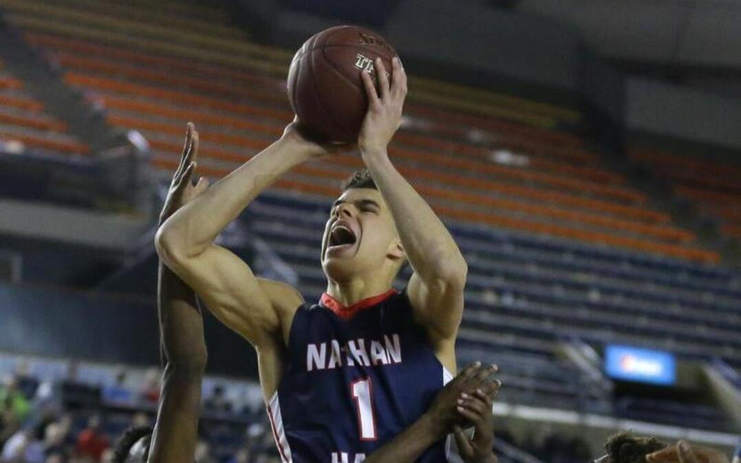Michael Porter Jr. (center), who led Nathan Hale High School in Seattle to a state championship, was released from the national letter of intent he signed with Washington.