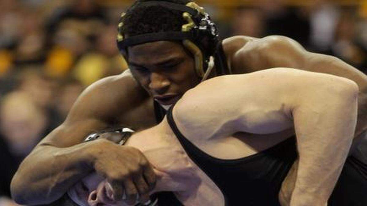 
Missouri’s J’den Cox, top, will be seeking a second straight national title — and the Tigers’ first team championship in any sport since 1965 — at this weekend’s NCAA wrestling championships.
