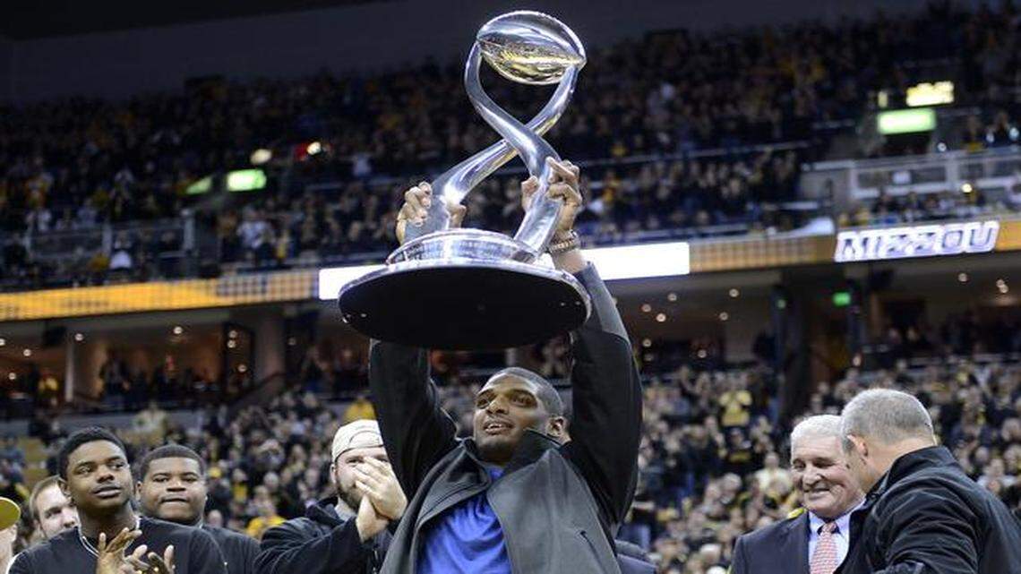 
The Missouri football team was honored at halftime of Saturday’s MU baseketball game against Tennessee, and Michael Sam got the chance to hoist the Cotton Bowl trophy up for all to see during the ceremony.
