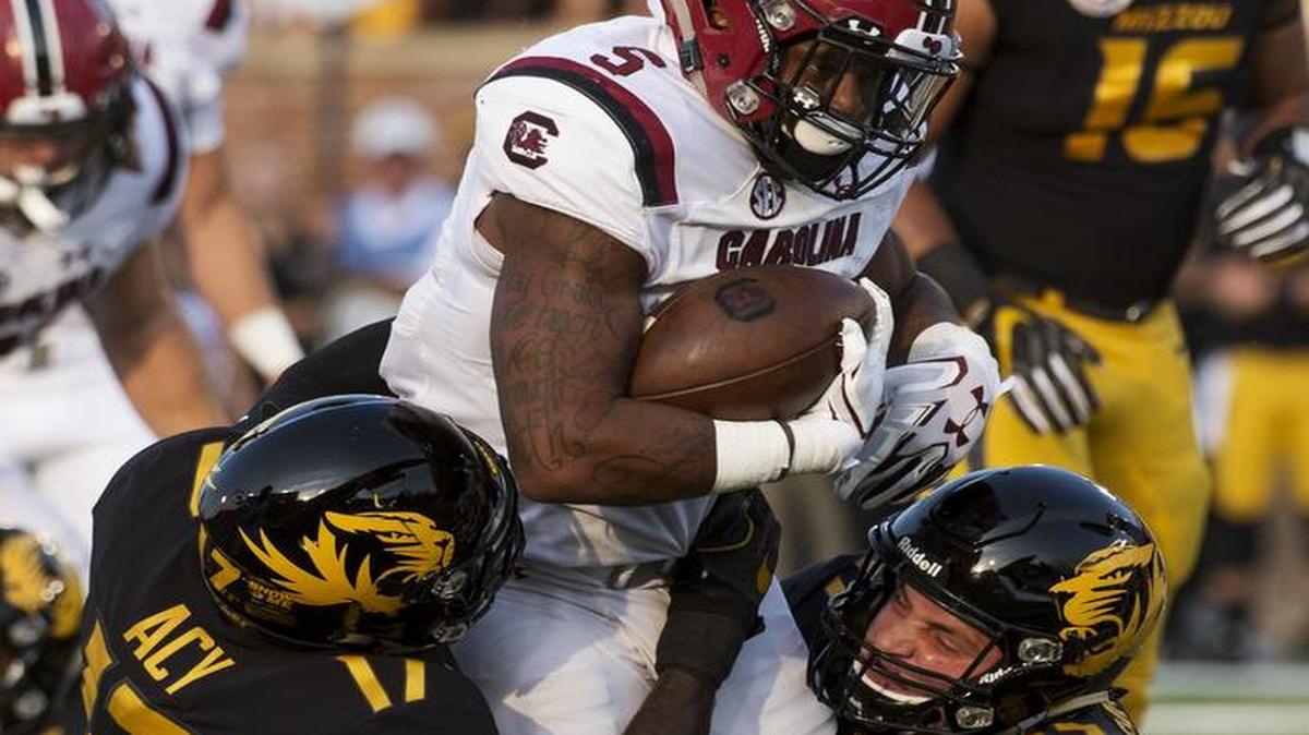Mizzou’s DeMarkus Acy (left), shown in a Sept. 9 game against South Carolina, was ejected in the first quarter of Saturday’s game at Kentucky.