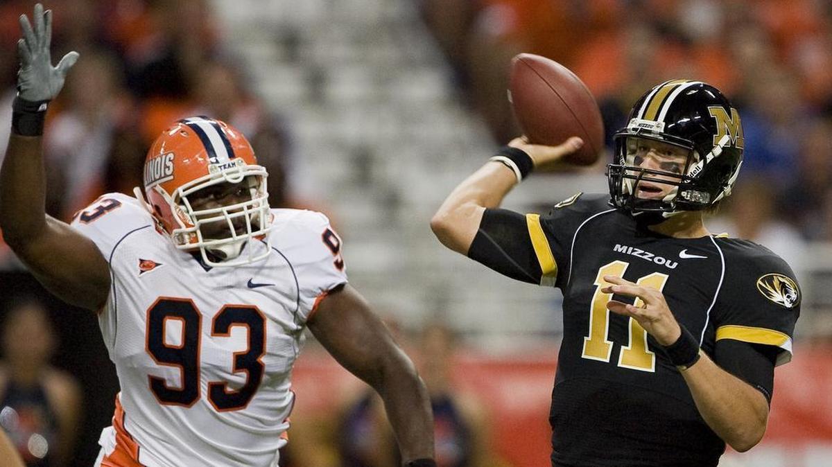 Illinois defensive tackle Corey Liuget (93) got his hands up as Missouri quarterback Blaine Gabbert (11) prepared to deliver a pass during the first quarter of the last Mizzou-Illinois football game, on Sept. 4, 2010 in St. Louis.