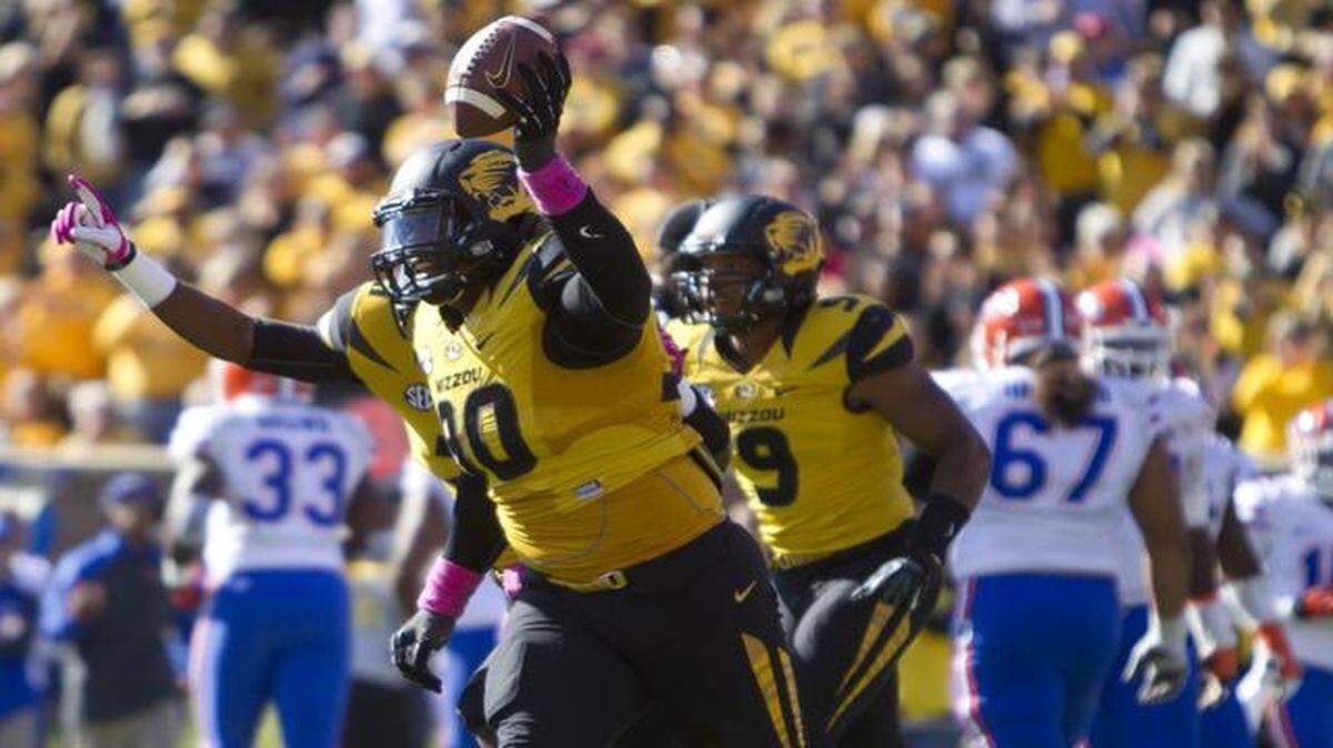 
Missouri defensive lineman Harold Brantley celebrated recovering a fumble by Florida quarterback Tyler Murphy in the fourth quarter last season in Columbia.
