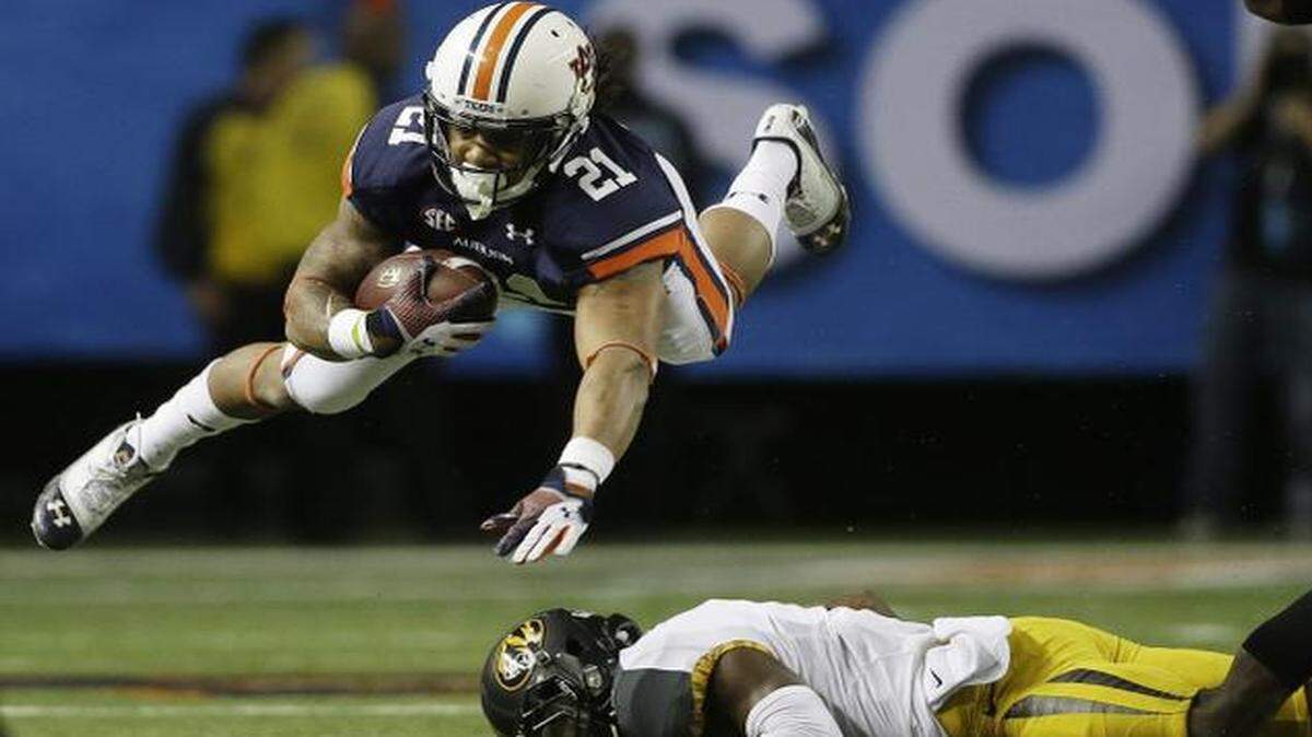 
Tre Mason and Auburn used a strong fourth quarter and pulled away from Missouri and John Gibson in last year’s SEC championship game.
