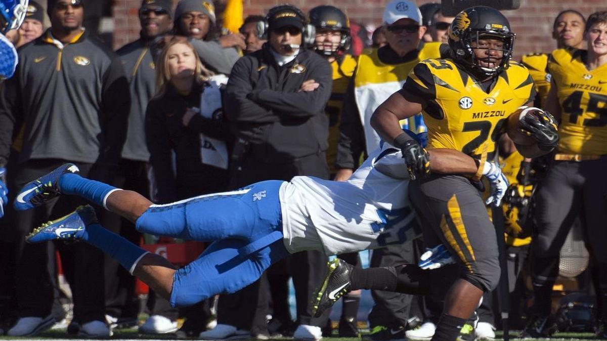 
Missouri running back Ish Witter, who broke the tackle of Kentucky’s Josh Forrest during a game last year, had two touchdowns in Thursday’s scrimmage.
