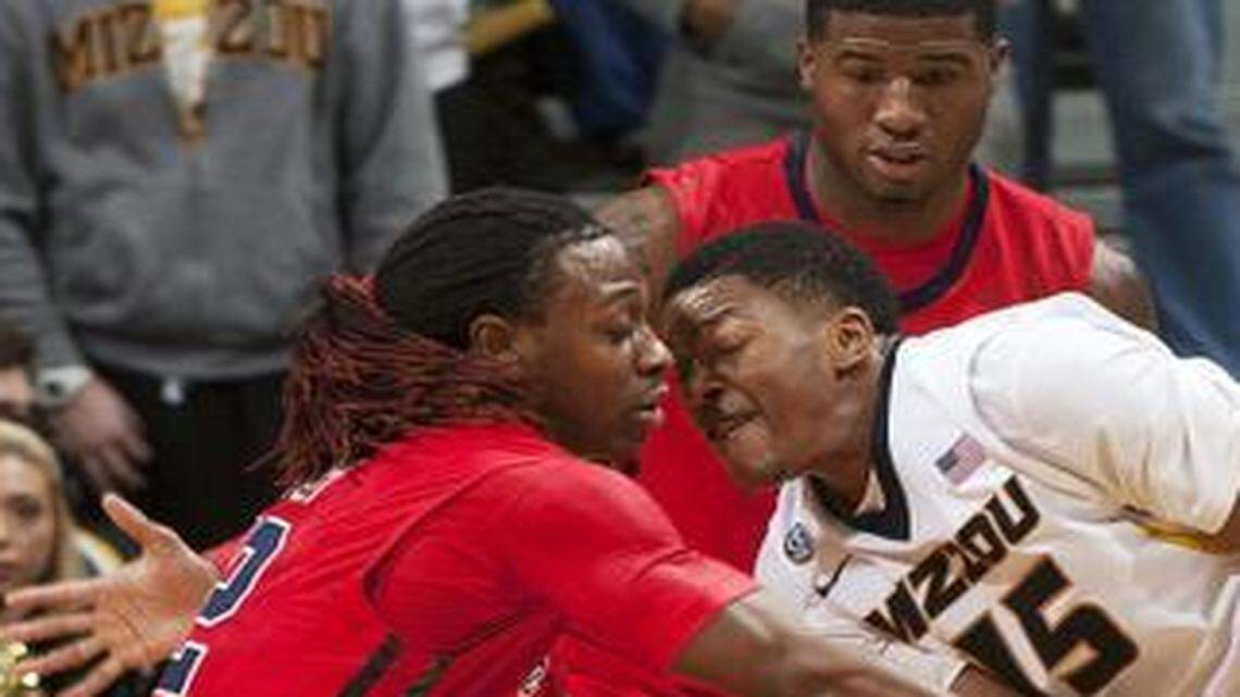 
Missouri’s Wes Clark (right), a sophomore point guard from Detroit, will miss the rest of the season because of a dislocated right elbow.
