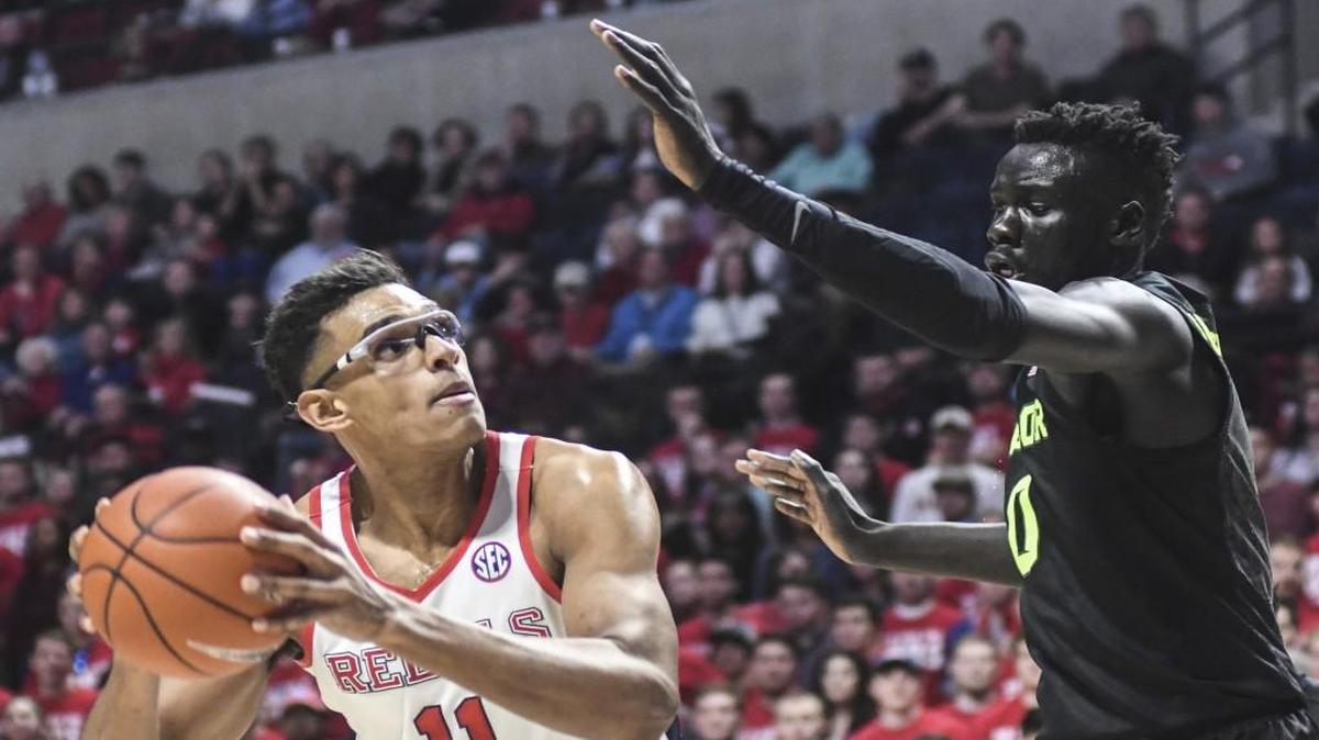 Mississippi forward Sebastian Saiz (left) shot against Baylor forward Jo Lual-Acuil Jr. during a game last month.