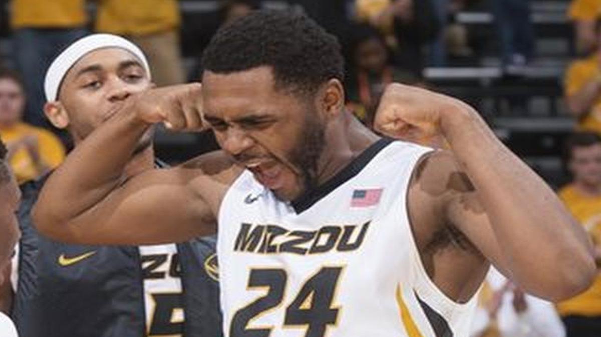 Missouri's Kevin Puryear, right, flexes as he is introduced before the start of an NCAA college basketball game against Omaha, Wednesday, Dec. 9, 2015, in Columbia, Mo. Missouri won the game 85-78. (AP Photo/L.G. Patterson)