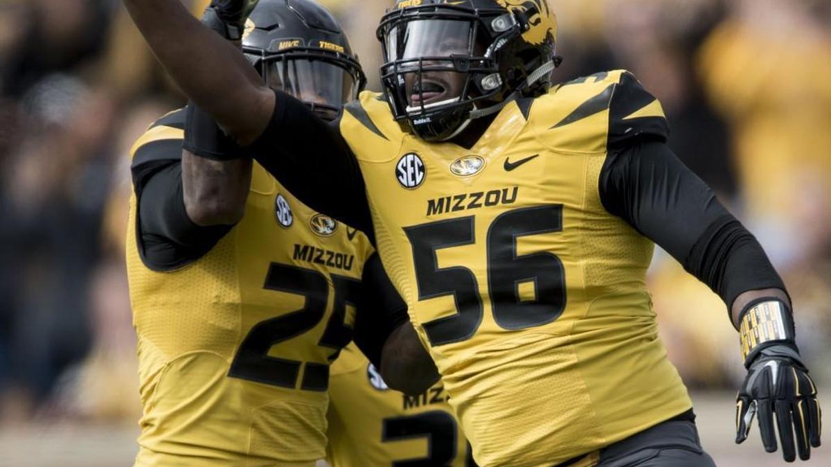 
Missouri Tigers defensive lineman Walter Brady (right) celebrated with linebacker Donavin Newsom after sacking South Carolina Gamecocks quarterback Lorenzo Nunez on Saturday.
