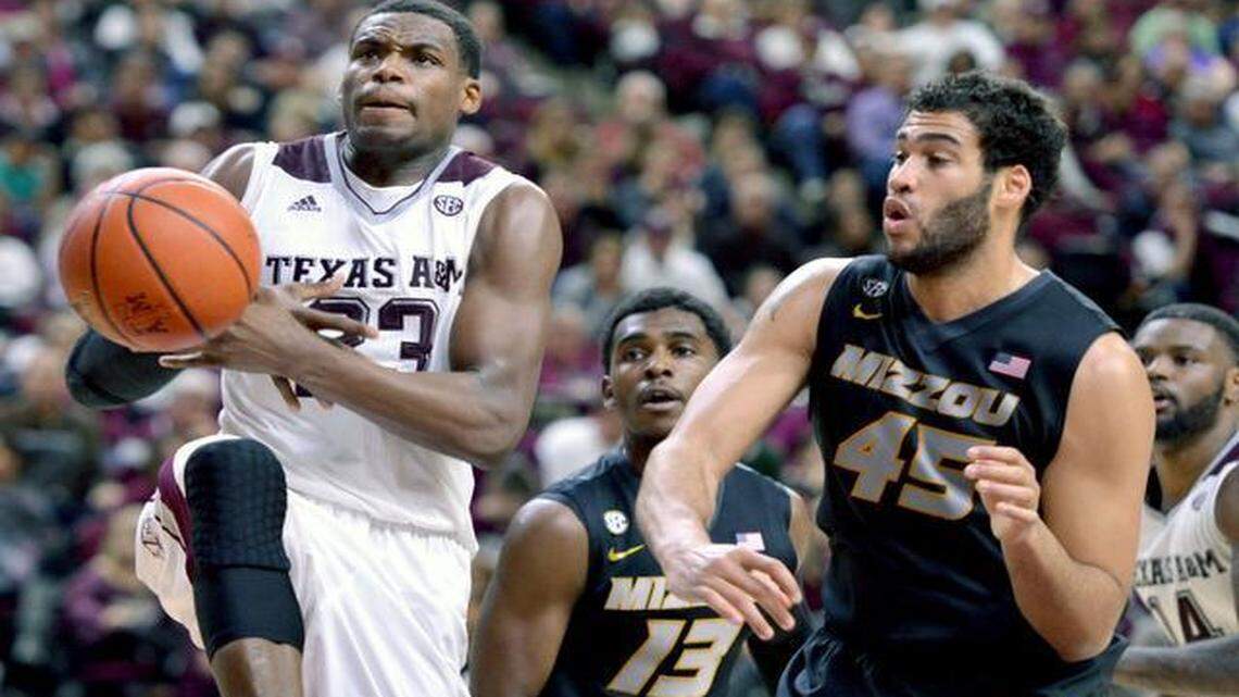 
Texas A&M’s Danuel House (23) had the ball knocked out of his hands by Missouri forward Keanau Post (45) on Wednesday night at Reed Arena in College Station Texas.
