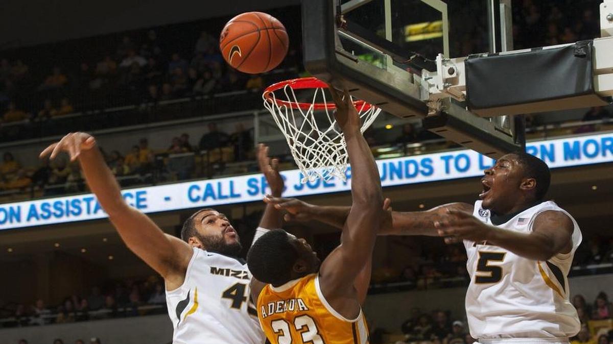 Valparaiso's Jubril Adekoya (center) had his shot blocked by Missouri's Keanau Post (left) as D'Angelo Allen (right) defended during a NCAA college basketball game a year ago in Columbia. Missouri won the game 56-41.