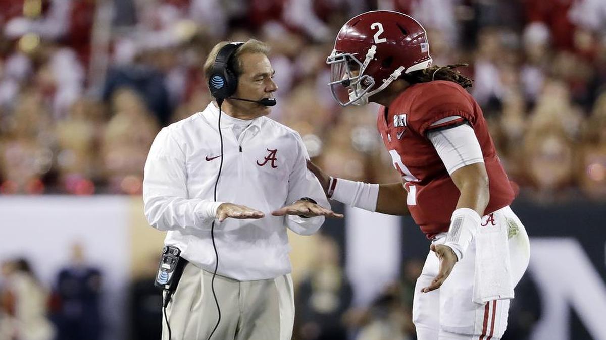 Alabama head coach Nick Saban spoke to Jalen Hurts during the first half of the NCAA college football playoff championship game against Clemson on Monday, Jan. 9, 2017, in Tampa, Fla.