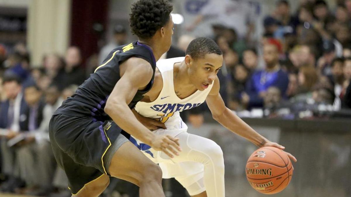 Simeon Career Academy’s Xavier Pinson (right) committed to Mizzou.
