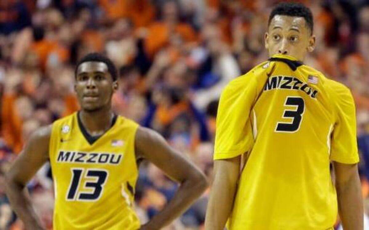 
Missouri’s Johnathan Williams III (right) and Montaque Gill-Caesar walked off the court at the end of Illinois’ 62-59 victory in the annual Braggin’ Rights game in St. Louis. The Fighting Illini won when Rayvonte Rice hit a three-pointer at the buzzer. 
