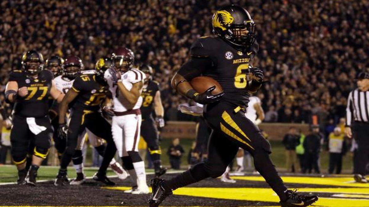 
Missouri running back Marcus Murphy scored on a 2-yard run Texas A&M during their Nov. 30 college football game in Columbia.
