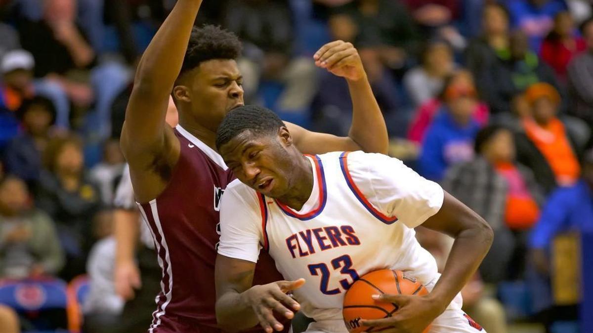 East St. Louis Jeremiah Tilmon in action during a game against Belleville West at East St. Louis High School.