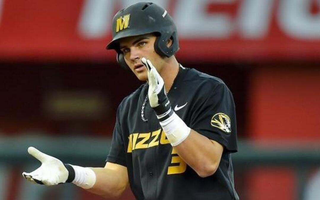 University of Missouri infielder Shane Benes (3) clapped after hitting a double in the college baseball game against Saint Louis University at Kauffman Stadium on Tuesday. Mizzou won 5-3.
