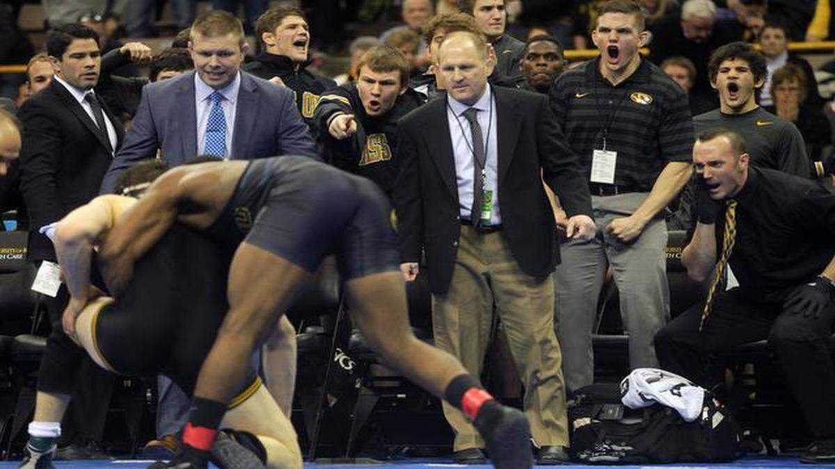 
Missouri teammates reacted as J’Den Cox scored a takedown against Iowa’s Nathan Burak during an EAS/NWCA National Duals finals college wrestling matchup on Sunday in Iowa City, Iowa.
