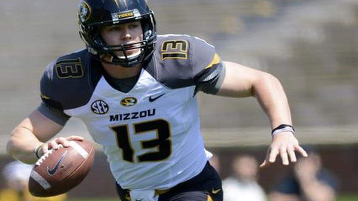 
Lee’s Summit graduate Corbin Berkstresser (13) is in a battle for the No. 2 quarterback spot with Eddie Printz. Maty Mauk is established as the starter.


