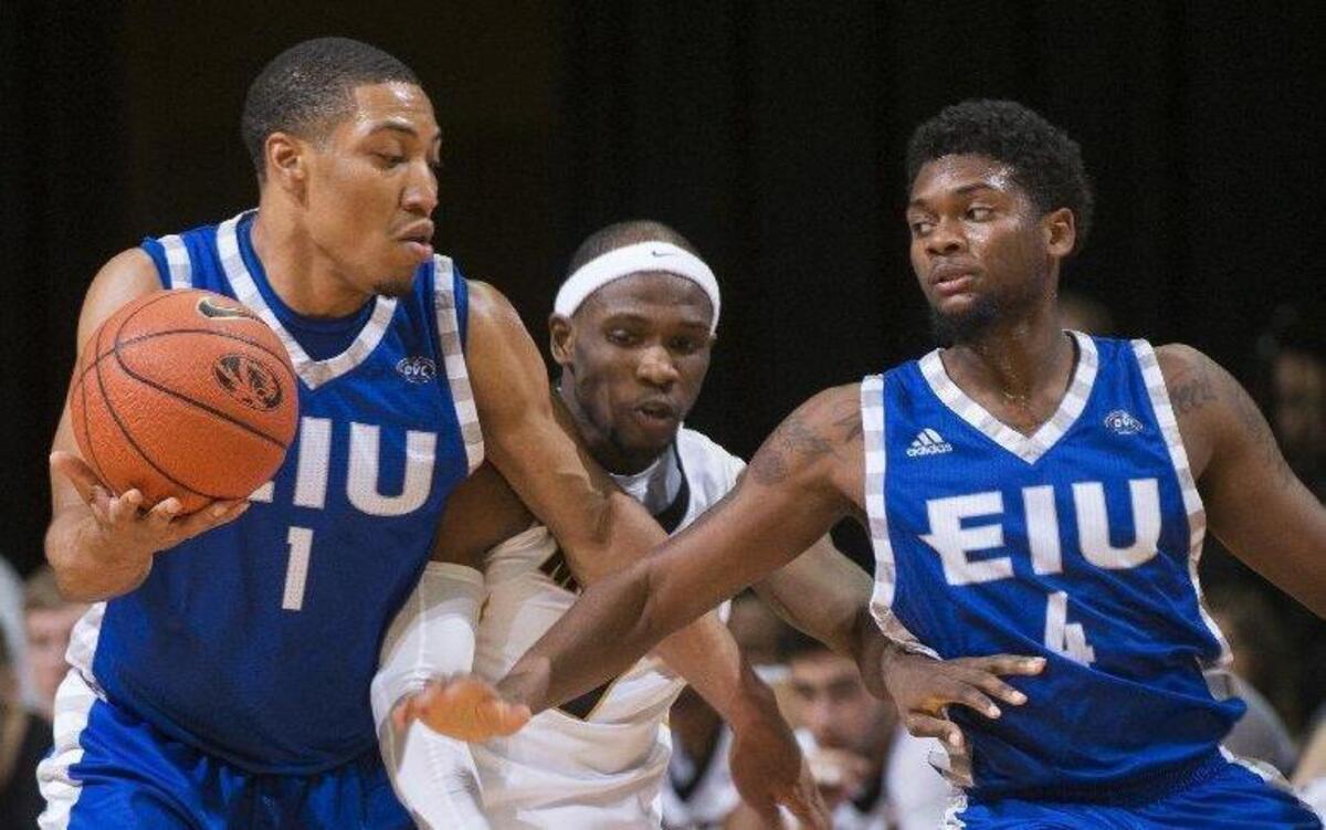 Missouri’s Terrence Phillips tried to squeeze between Eastern Illinois’ Demetrius McReynolds (left) and Montell Goodwin while playing defense in the first half of Saturday’s game in Columbia.