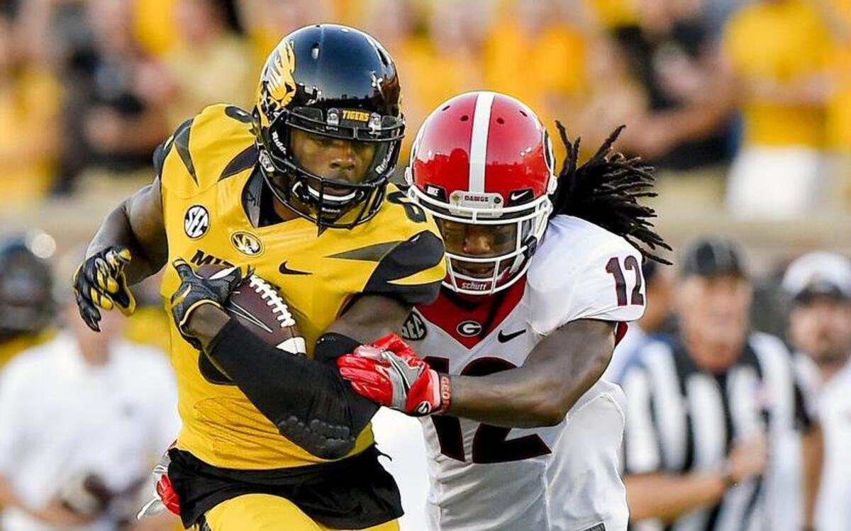 Missouri senior wide receiver J’Mon Moore (left), who is from Missouri City, Texas — a Houston suburb — has been checking on his family after Hurricane Harvey hit the area.