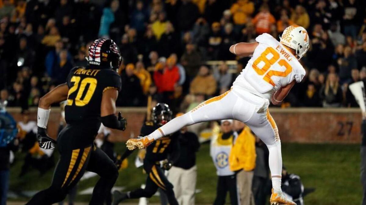 Tennessee tight end Ethan Wolf caught a touchdown pass in front of Missouri safety Kaleb Prewett during a game in November.