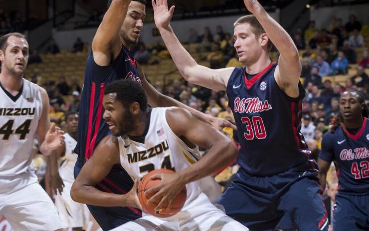 Mizzou’s Kevin Puryear (center) looked for help in a game against Mississippi in February. Puryear characterized this season’s program as “very high energy and high tempo. The competition level is great every single day.”