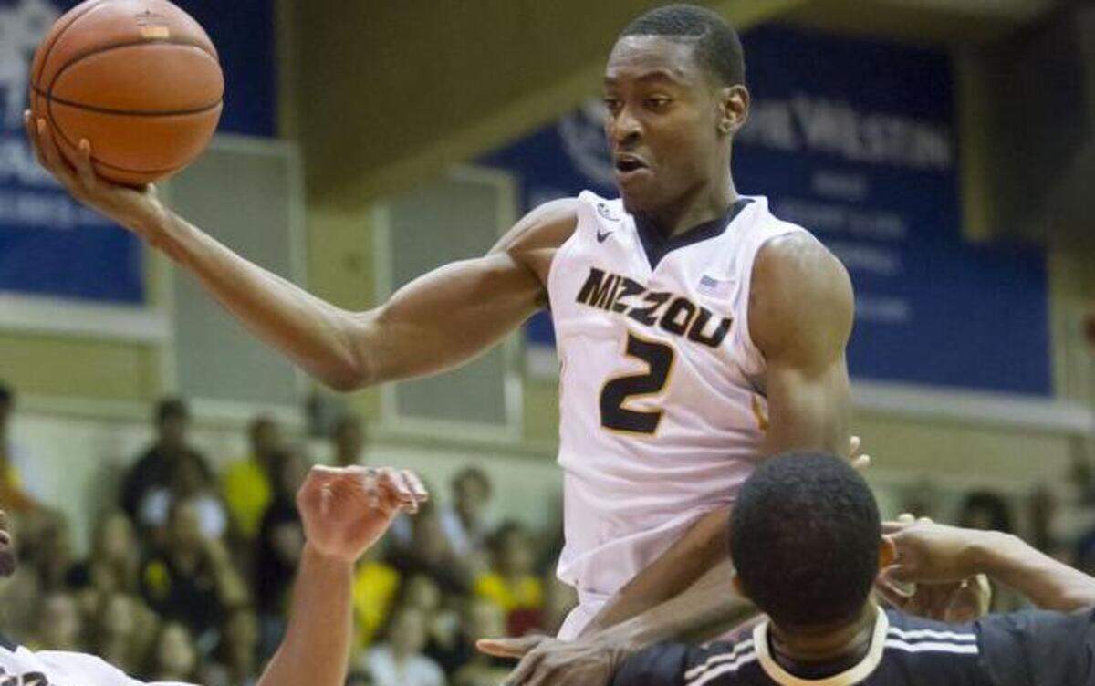 
Purdue forward Basil Smotherman (right) drew a charging foul on Missouri guard Deuce Bello in the first half Tuesday at the Maui Invitational.
