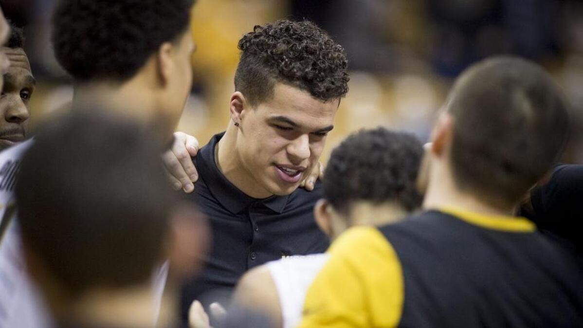 Missouri Tigers forward Michael Porter Jr. (middle) appeared to smile as he huddled with the team before the Mizzou-Texas A&M Southeastern Conference basketball game at Mizzou Arena on Tuesday, February 13, 2018, in Columbia.