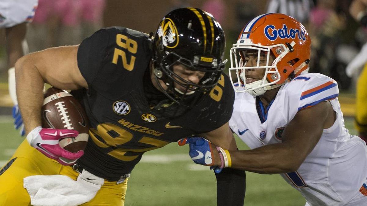 Missouri tight end Clayton Echard, left, is tackled by Florida’s Vernon Hargreaves III during the first half of an NCAA college football game, Saturday, Oct. 10 2015, in Columbia, Mo.