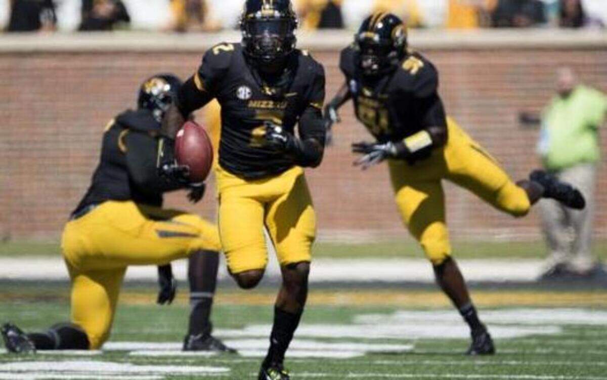 
Tigers defensive back Duron Singleton headed toward the end zone after picking up a fumble in the fourth quarter of last Saturday’s win over Central Florida.
