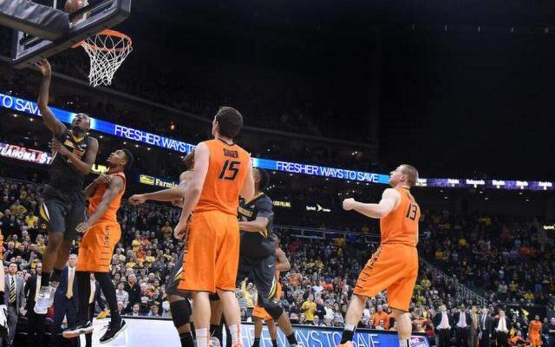 
Missouri’s D’Angelo Allen missed this shot at the end of overtime, but it was off the mark and Oklahoma State beat the Tigers 74-72 at the Sprint Center.


