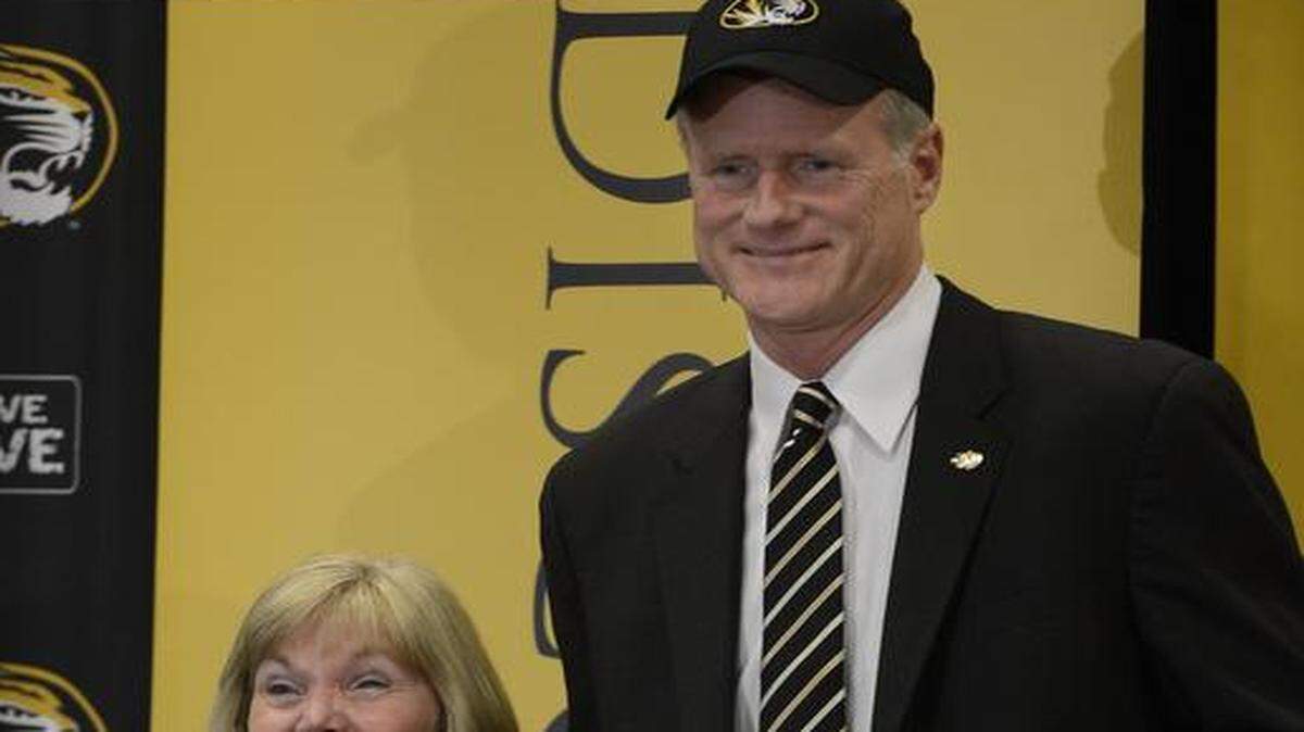 
A former player at Missouri, Kim Anderson is the Tigers’ new men’s basektball coach. At left is his wife, Melissa.
