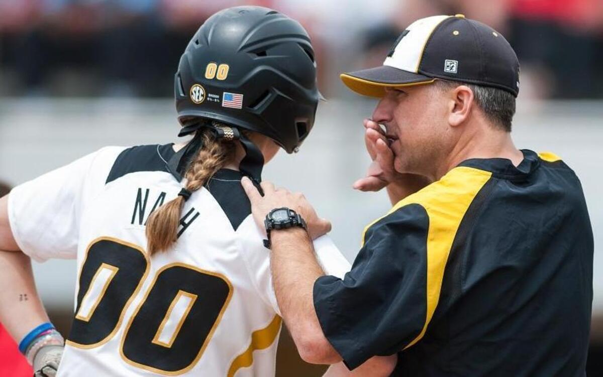 Missouri softball coach Ehren Earleywine talked with player Regan Nash during a stoppage of play against Nebraska in an NCAA regional softball in May in Columbia. Earleywine told reporters Friday that he essentially was given his walking papers by then-athletic director Mack Rhoades early into an investigation of alleged verbal abuse of players.