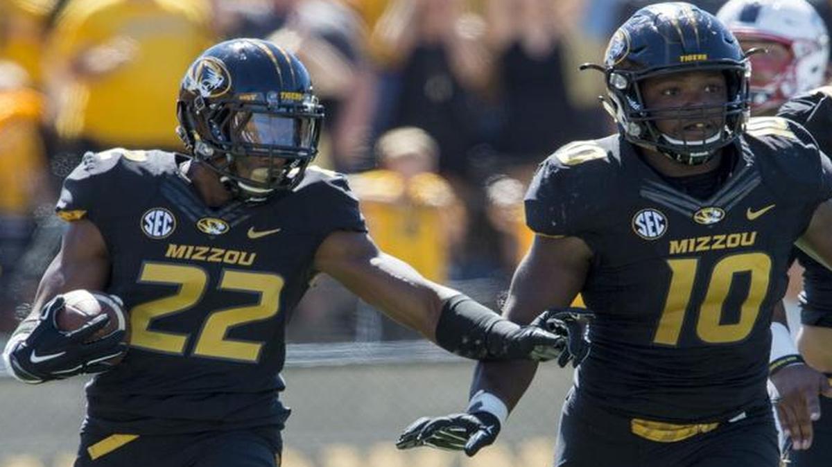 
Missouri Tigers defensive back Anthony Sherrils (left) has averaged 17.8 yards on kickoff returns in addition to making this interception return on a fake field goal by Connecticut on Sept. 19.
