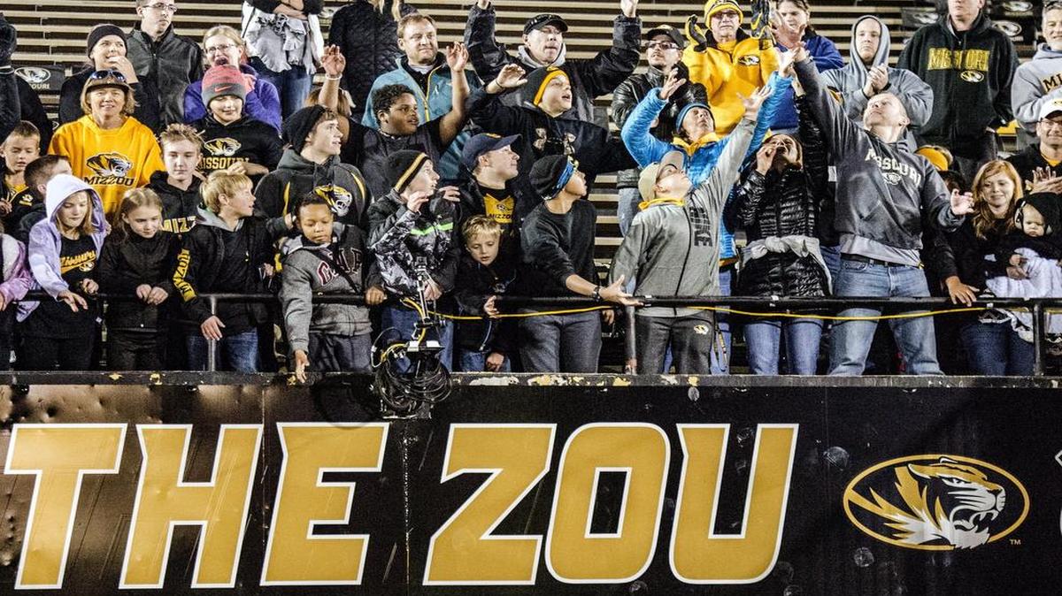 Missouri football fans gathered near the locker room to catch gloves from players last season on Faurot Field in Memorial Stadium.