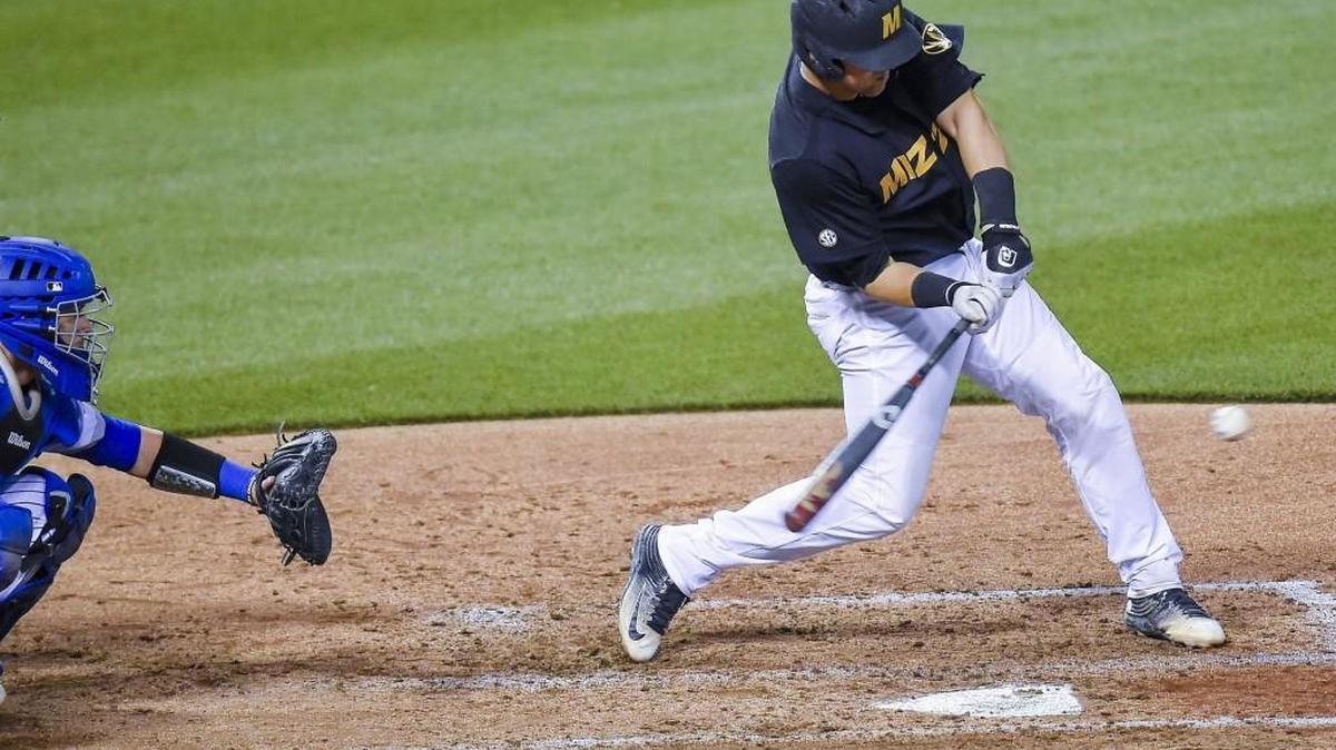 University of Missouri infielder Brett Bond (5) hit a double in the sixth inning in the college baseball game against Saint Louis University at Kauffman Stadium on Tuesday. Mizzou won 5-3.