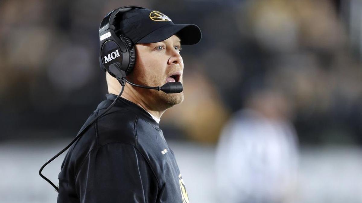 Missouri football coach Barry Odom watches from the sideline during the first half of a game against Tennessee on Saturday, Nov. 11, 2017, in Columbia, Mo.