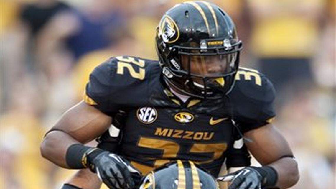 
Last season, Mitch Morse (bottom) got used to hoisting teammates who scored touchdowns, like Russell Hansbrough. Morse would like to do more of it in 2014. 
