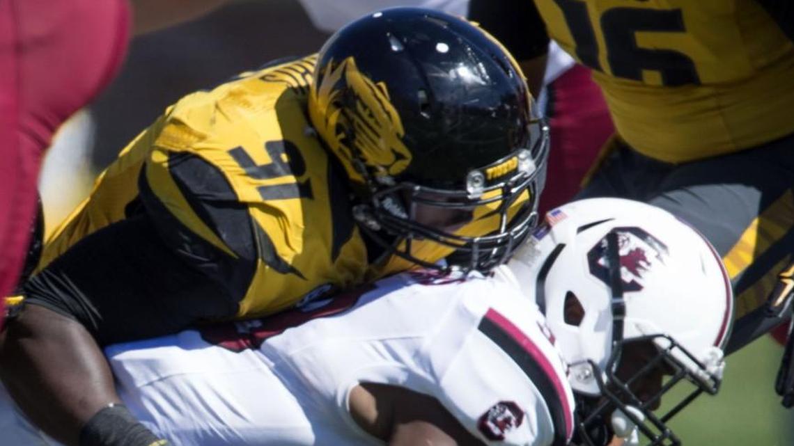 Tigers defensive end Charles Harris, who tackled South Carolina’s David Williams in October, credits his youth boxing training with some of his success on the football field.