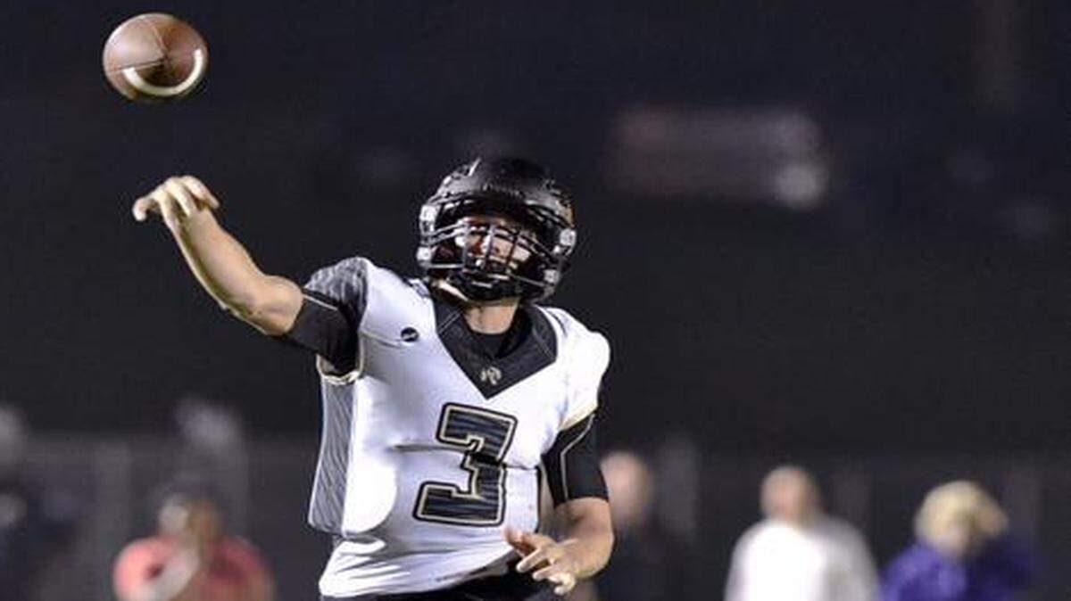 
Lee’s Summit quarterback Drew Lock completed nearly 63 percent of his passes and threw for 5,779 yards with 63 touchdowns and only 12 interceptions the last two seasons. He signed a letter of intent Wednesday to play at Missouri.


