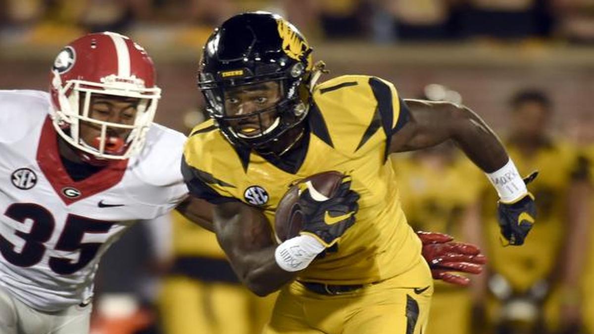 Missouri’s Chris Black (right) averages 12.3 yards per punt return this season.