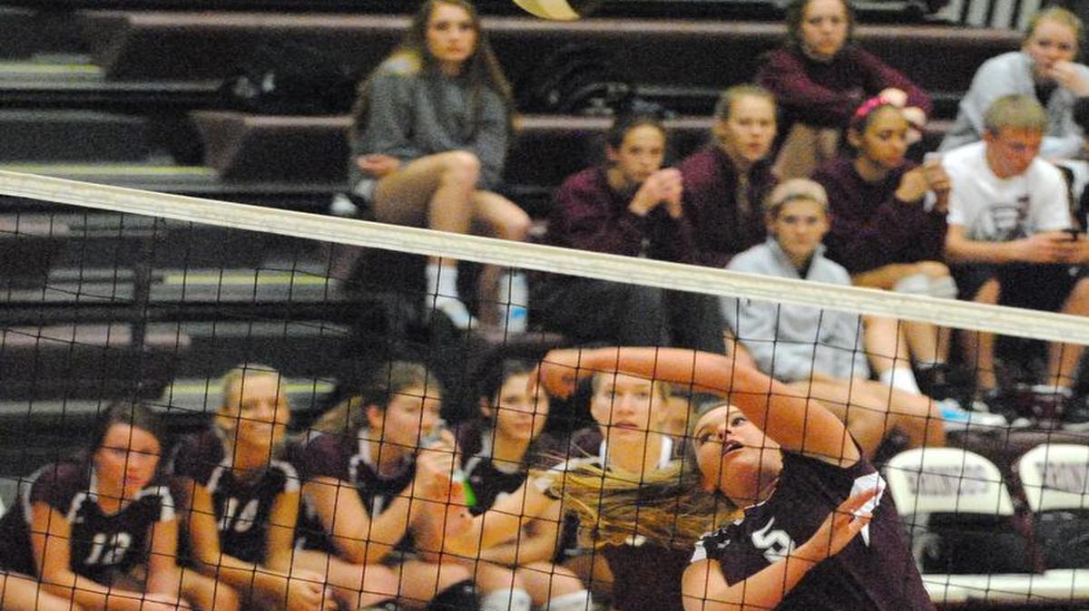 Alexa Ethridge (right) of Lee’s Summit North started her college volleyball career at Nebraska but now plays for Missouri.